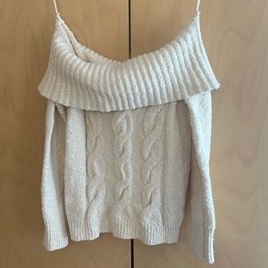 Free People, off- the shoulder cream sweater.